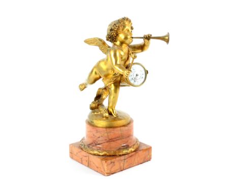 A late 19th century French gilt bronze figure of a winged cherub standing on one foot, blowing a horn, a drum slung to his si