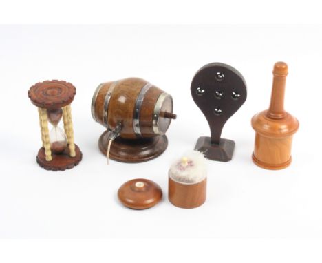 Five pieces of 19th Century treen comprising a faded rosewood barrel form string box with silver plated bands and tap, 9cm, a