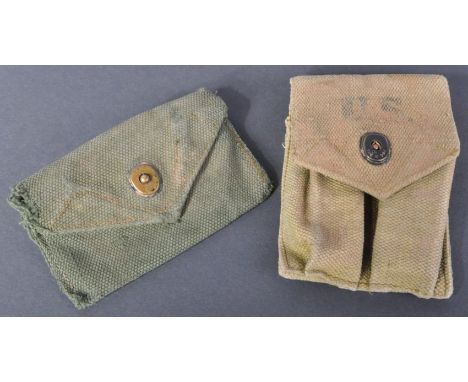 Two WWII Second World War period US United States Army webbing belt pouches. One being a desert camo example with two front m