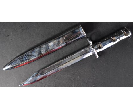 An original British Army L1A3 SLR Self Loading Rifle ceremonial bayonet. The polished steel bayonet having a hooked pommel wi