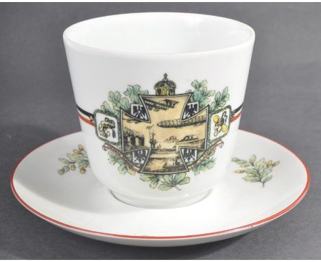 WWI First World War Interest - a 20th century Vohenstrauss of Germany made ceramic cup and saucer, the cup depicting an Iron 