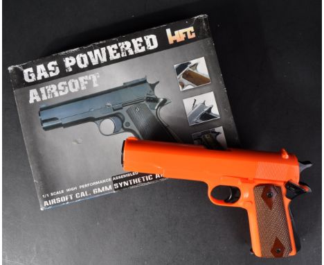 An original HFC made .6mm gas powered airsoft BB gun / pistol. Working hammer and trigger spring loaded magazine and safety l