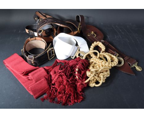 A collection of assorted British Army Officers uniform belts and ceremonial sashes to include Sam Browne belts, Royal Marines