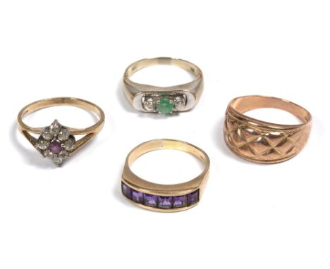 A 9 CARAT GOLD RING, a 9 carat gold amethyst set ring and a ruby style set ring (4) 