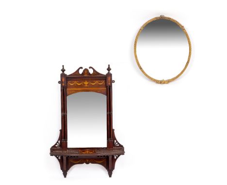 AN EDWARDIAN MAHOGANY WALL MIRROR with swan neck pediment and turned finials, decorative classical inlay, outset pilaster col