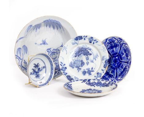 AN 18TH CENTURY ENGLISH DELFT BASIN  with blue and white decoration, 30.5cm diameter together with three Delftware plates and
