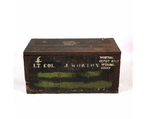 A LARGE WOODEN TRUNK 'Worton Depot, RMP Woking, Surrey', with metal mounts, 104cm x 56cm x 60cm