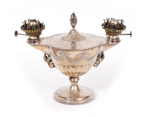 A MAPPIN &amp; WEBB SILVER PLATED TWIN BURNER OIL LAMP with rams head mounts, 28cm wide x 21cm high together with a large bra