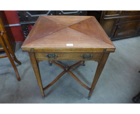 An Edward VII mahogany envelope card table, stamped W. Walker &amp; Sons, Bunhill Row, London, E.C. 