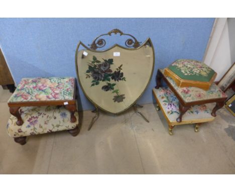 An Art Nouveau brass and painted mirrored firescreen, a/f and stools 