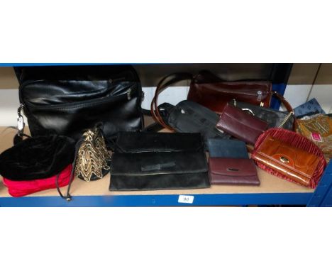 A shelf of assorted bags and purses.