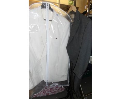 A white dinner jacket and a vintage grey tail coat.