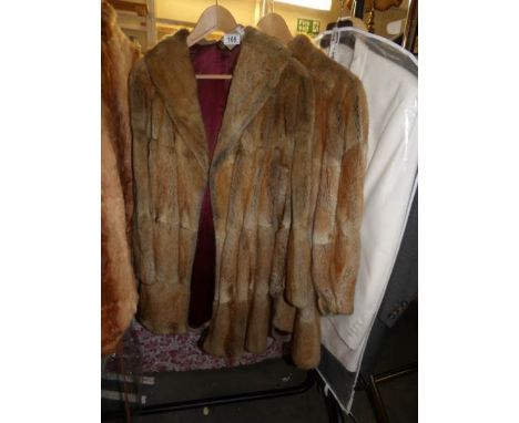 2 vintage fur coats.