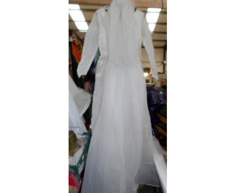 A vintage wedding gown with veil.