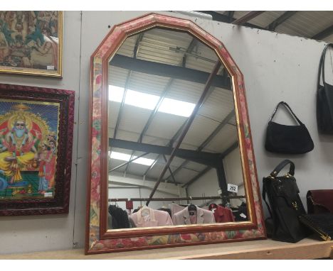 A wall mirror