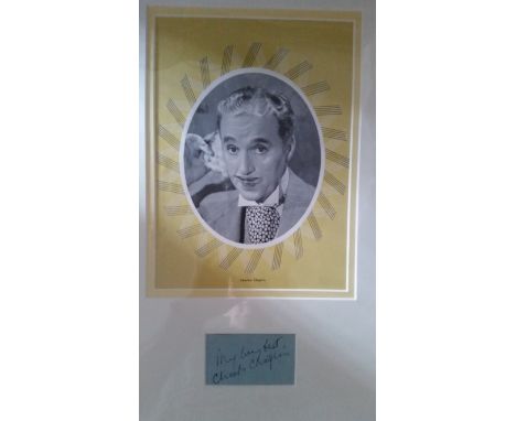 CINEMA, signed piece by Charlie Chaplin, overmounted beneath colour print, 10.5 x 16 overall, EX