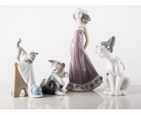 Three Lladro figures - cat with mouse, cat, girl in flowing purple gown, two Nao ducks, cat with ball of wool, two cranes, (7