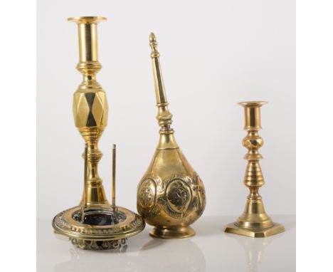 Brass Corinthian column lamp, brass candlesticks, and a Mamod steam engine.
