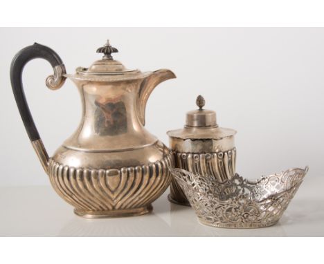 A late Victorian silver tea caddy by William Comyns & Sons, London 1895, circular body with gadrooned design, 12cm; together 