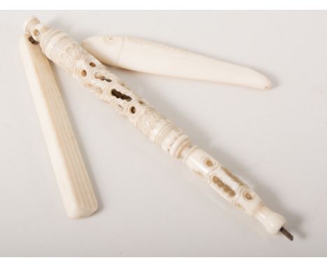 Carved bone pen, with Stanhope viewer, and small carvings of tools, fish, cricket bat etc.