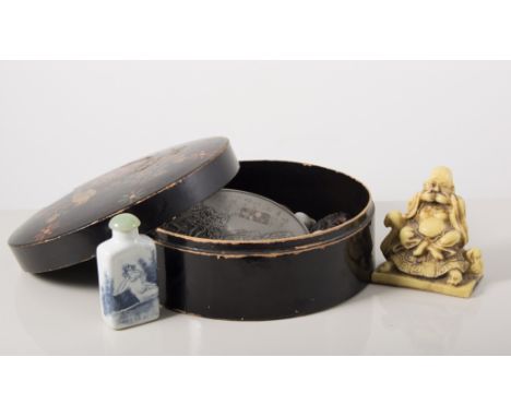 Small quantity of animalia, carved resin and ceramic, snuff bottle, in a circular laquered box (two boxes).