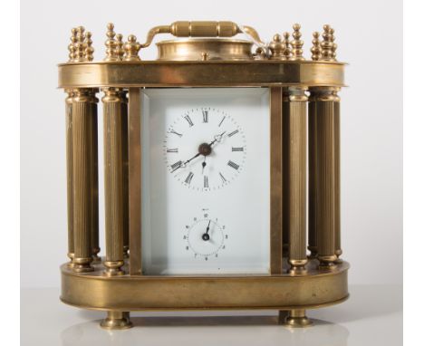 Two modern mahogany cased aneroid barometers and a reproduction carriage clock with bell strike alarm, ornate case with five 