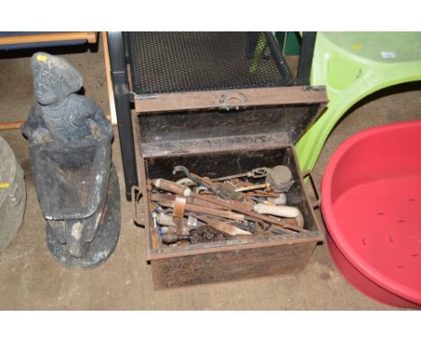 A metal box and contents of various hand tools 