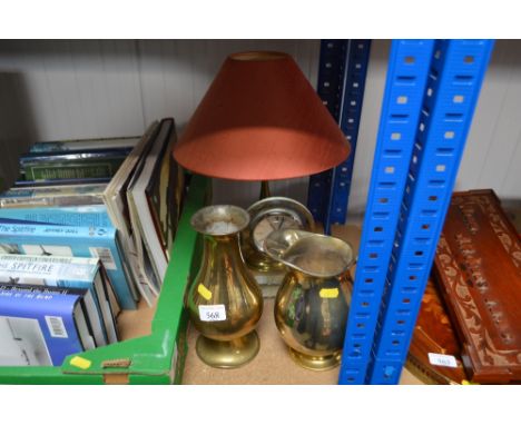 A mantle clock together with a table lamp and shade and two jugs