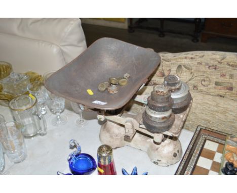 A set of kitchen scales and weights 