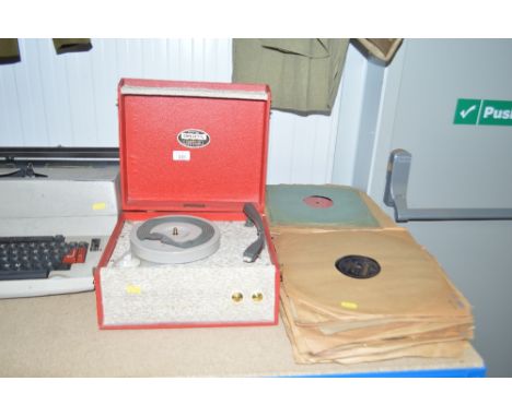 A Dansette record player and a quantity of records
