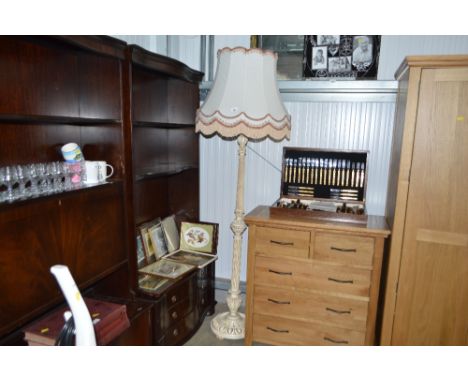 A standard lamp and shade 