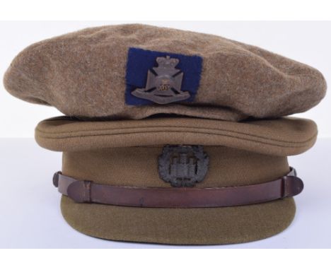 WW2 Essex Regiment Officers Service Dress Peaked Cap, complete with the original bronze officers regimental cap badge to the 