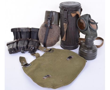 WW2 German Combat Equipment Grouping consisting of original WW2 German army issue gas mask with original filter, canister wit
