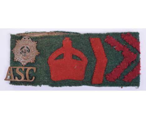 WW1 Woman’s Land Army Armband, of green wool with red cloth crown to the centre and three field made service chevrons attache