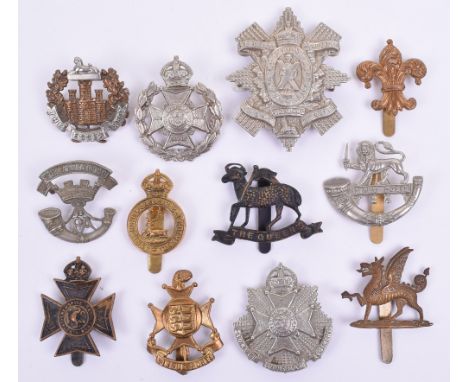 12x Territorial Battalion Cap Badges, consisting of Glasgow Highlanders Highland Light Infantry with two lug fittings, brass 
