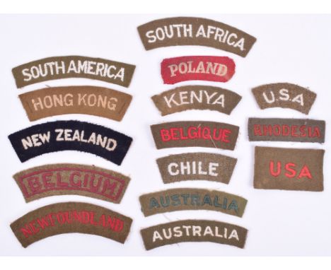 Selection of WW2 Cloth Nationality Shoulder Titles consisting of embroidered white on khaki South America, white on khaki Ken