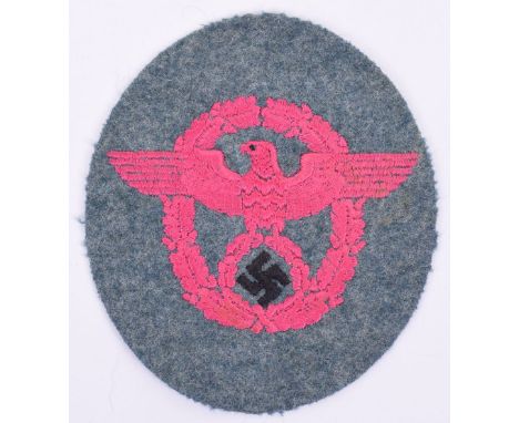 WW2 Third Reich Fire Police Cloth Arm Badge, pink embroidered Police pattern eagle in wreath with black swastika on Police fi