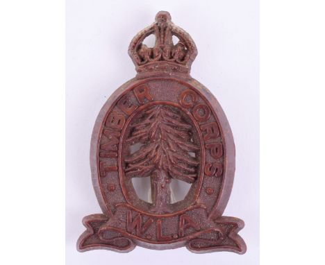 Scarce WW2 WLA Timber Corps Plastic Cap Badge complete with two blade fittings on the reverse. Marked 1-A A STANLEY & SONS WA