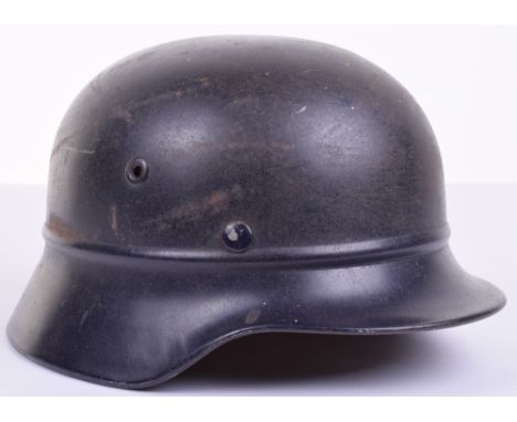 WW2 German Home Front Beaded Combat Helmet, retaining much of its original blue paint finish to the exterior and interior. Co