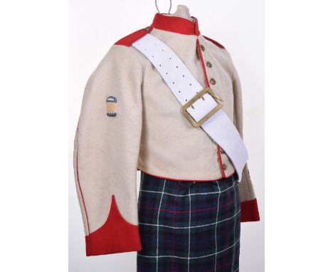 Post 1902 Seaforth Highlanders Drummers Tunic, being a short shell jacket type tunic with red facings to the collar, cuffs an