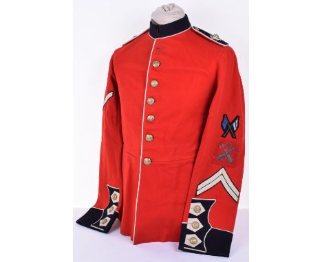 Royal Marine Light Infantry Dress Tunic, being a pre WW1 example. Scarlet cloth with dark navy blue facings. Embroidered glob