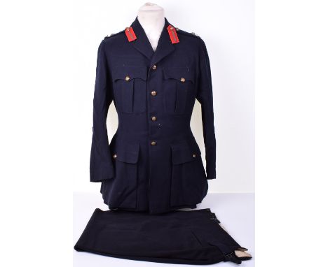 Uniform of Lieutenant Colonel G K Gregson DSO, consisting of four pocket No1 dress tunic with brass George V buttons to the f