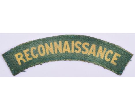 WW2 Printed Reconnaissance Corps Shoulder Title, yellow lettering on green backing. Uniform removed example.