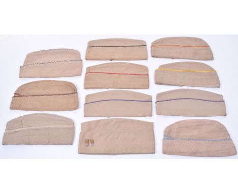 11x American Military Garrison / Side Caps, all being light tan summer issue examples with various colour piping for differen