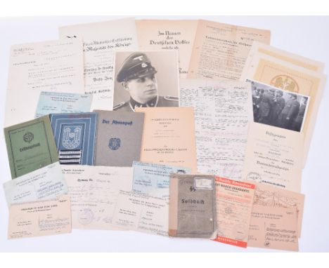 Waffen-SS Soldbuch, Award Citation and Document Grouping of SS Unterscharfuhrer Kurt Graupner, the soldbuch is a well used ex