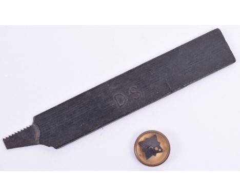 Rare Royal Air Force Escape and Evasion Concealed Hacksaw Blade, housed in its rubber covering stamped DS. Covering partially