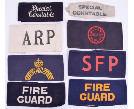 Selection of Home Front Armbands, consisting of early type printed black on white ARP armband, Emergency Road Repairs printed