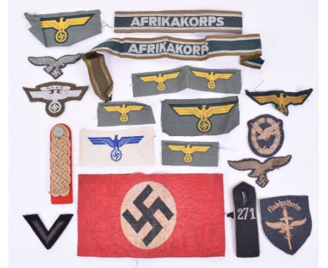 Selection of WW2 German Cloth Insignia, consisting of printed NSDAP red cotton armband, Afrika Korps cuff title, NSKK silver 