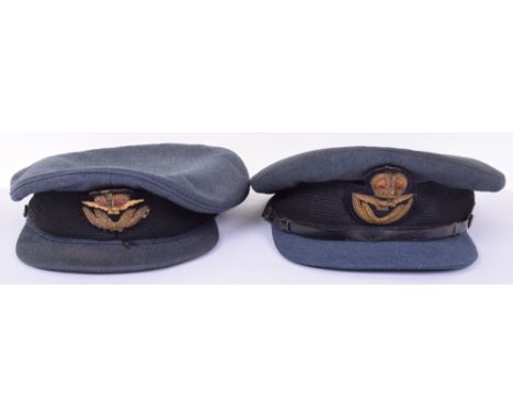 2x Royal Air Force Officers Service Dress Peaked Caps, one being of WW2 period and the other of just post war form. Both caps