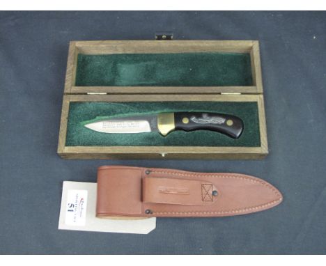 A German Puma 222 years commemorative steel, brass and horn hunting knife (1991) with heavy quality leather scabbard, contain